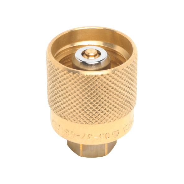 A metallic brass fitting with a textured grip surface sits vertically. It features embossed markings: 